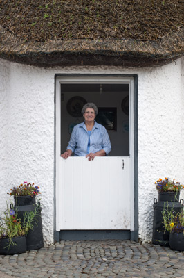 Hilda Winter at the door of Dan Winter's Cottage